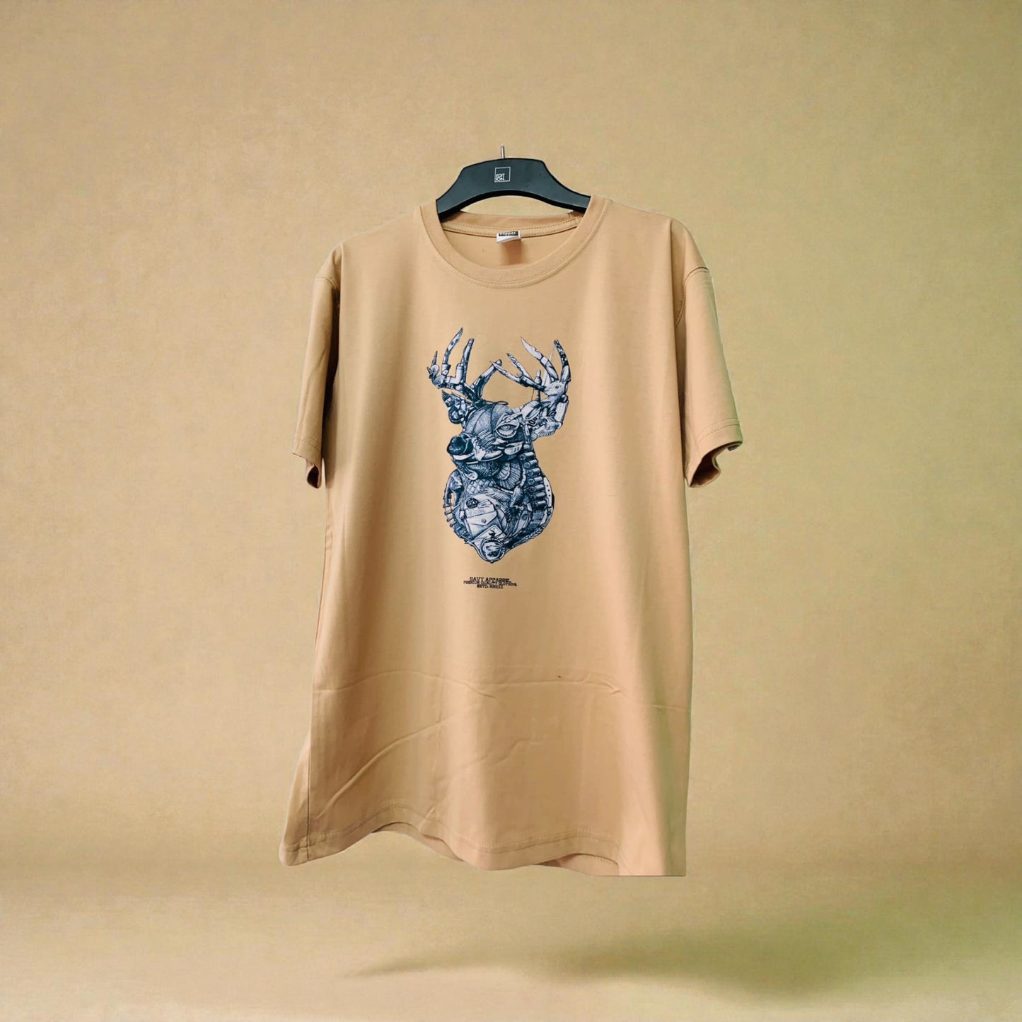 Beige t-shirt with blue deer graphic on a beige background